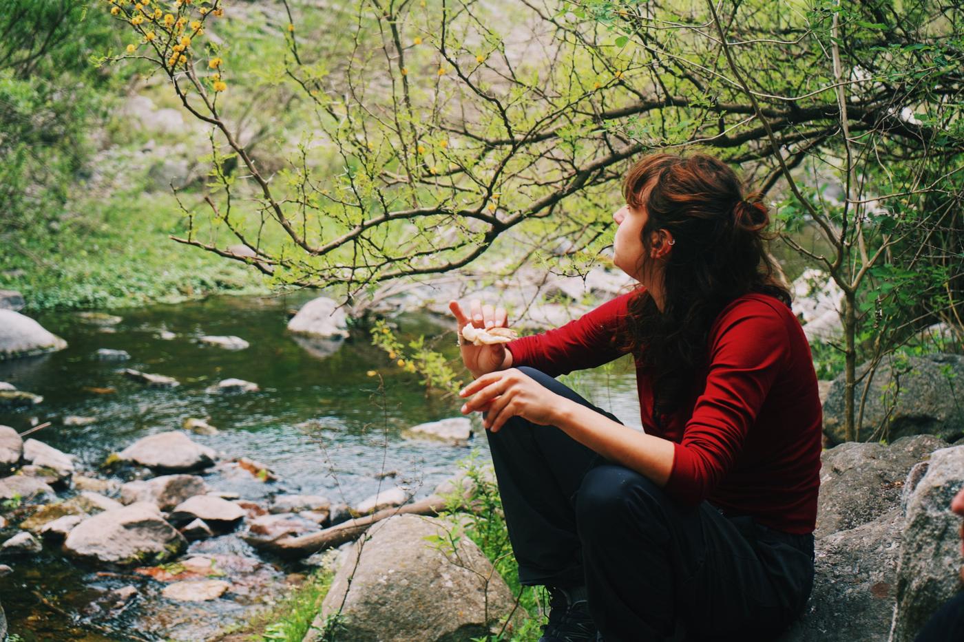 Traveler resting by the river
